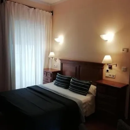 Отель Plateros